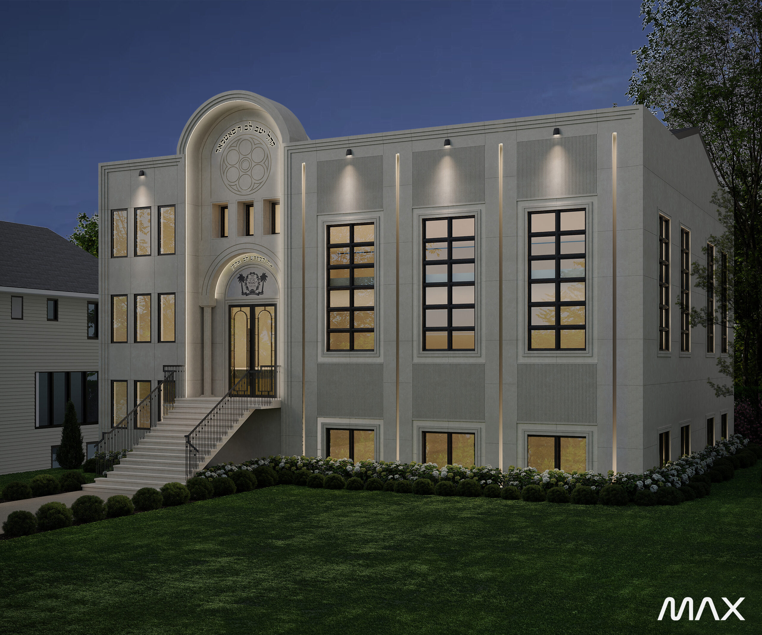 Modern building with illuminated windows at night.