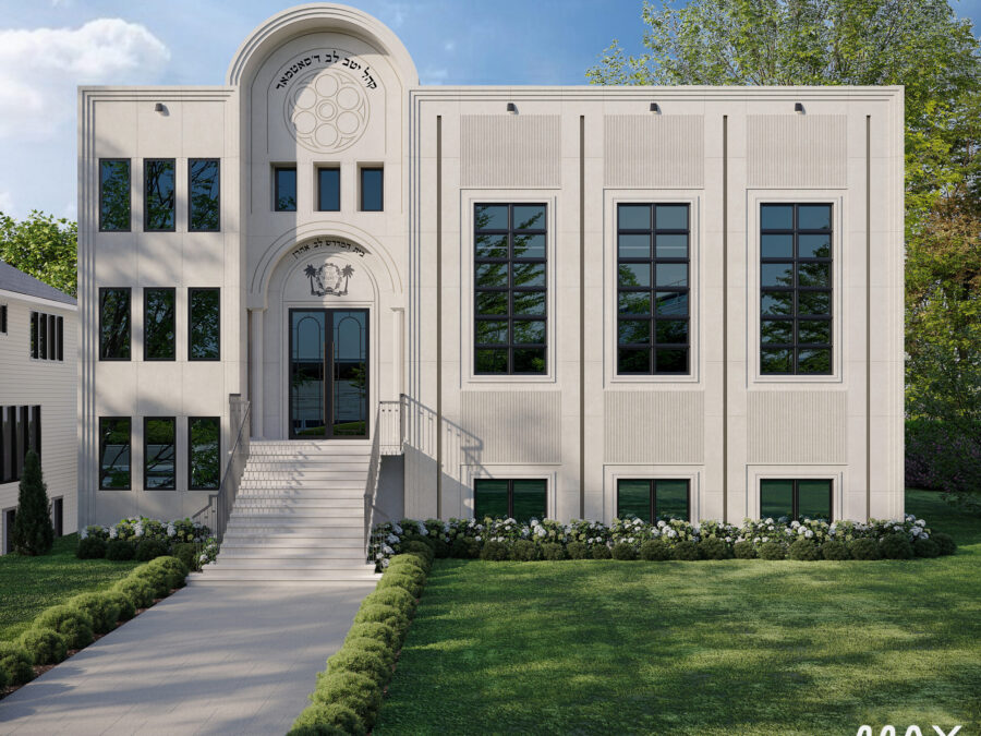 White building with arched entrance and windows.