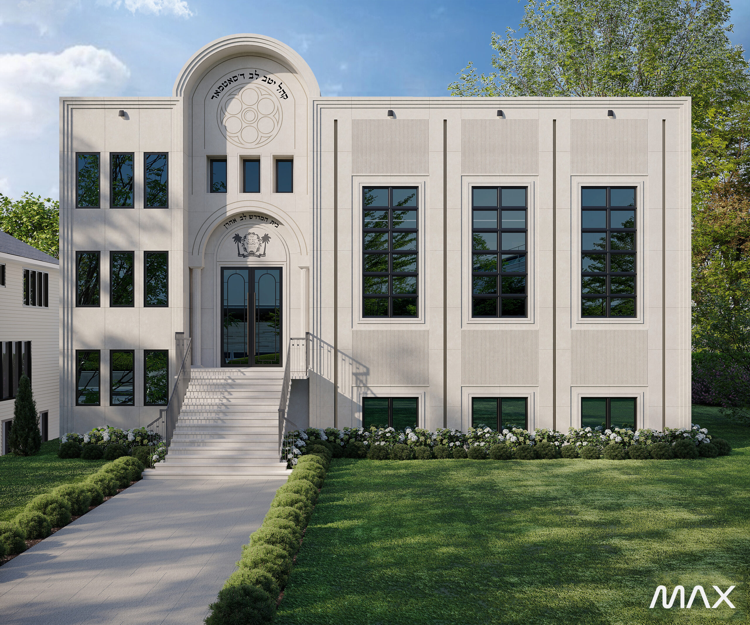 White building with arched entrance and windows.