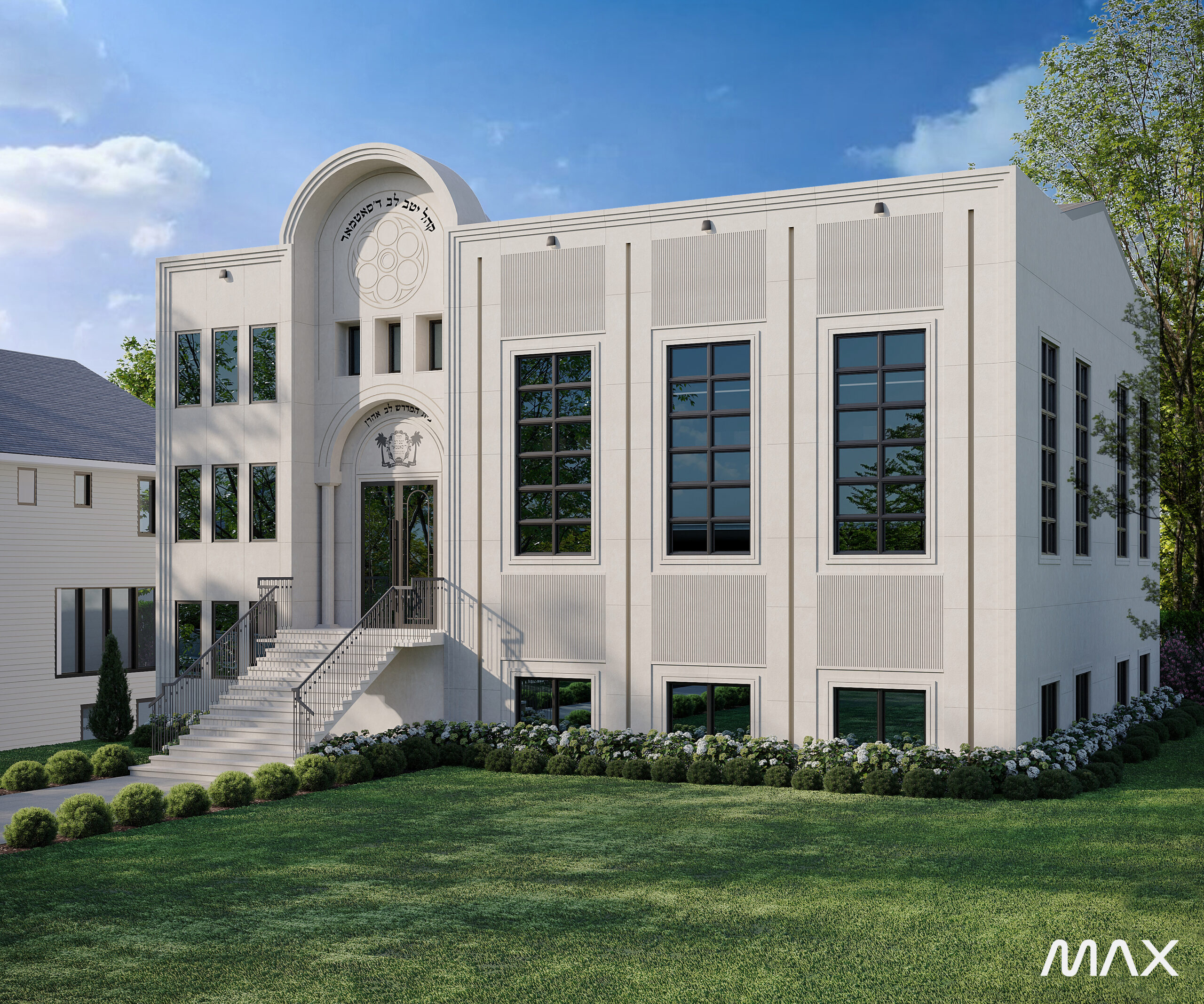 Modern white building with large windows.