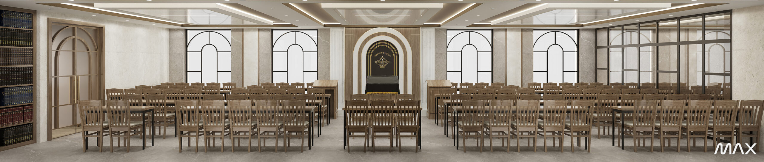 Spacious lecture hall with wooden chairs.