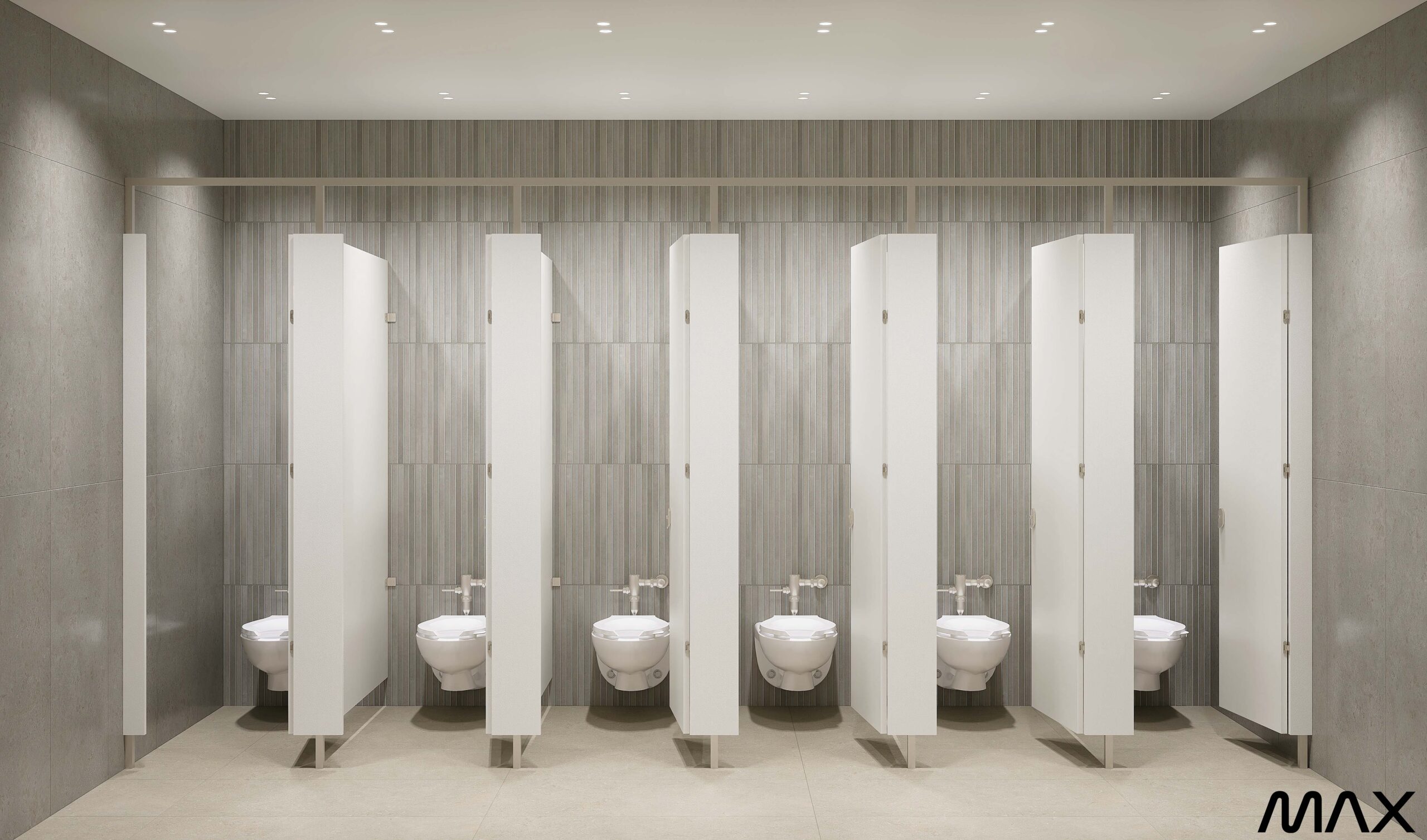 Modern public restroom stalls with toilets.