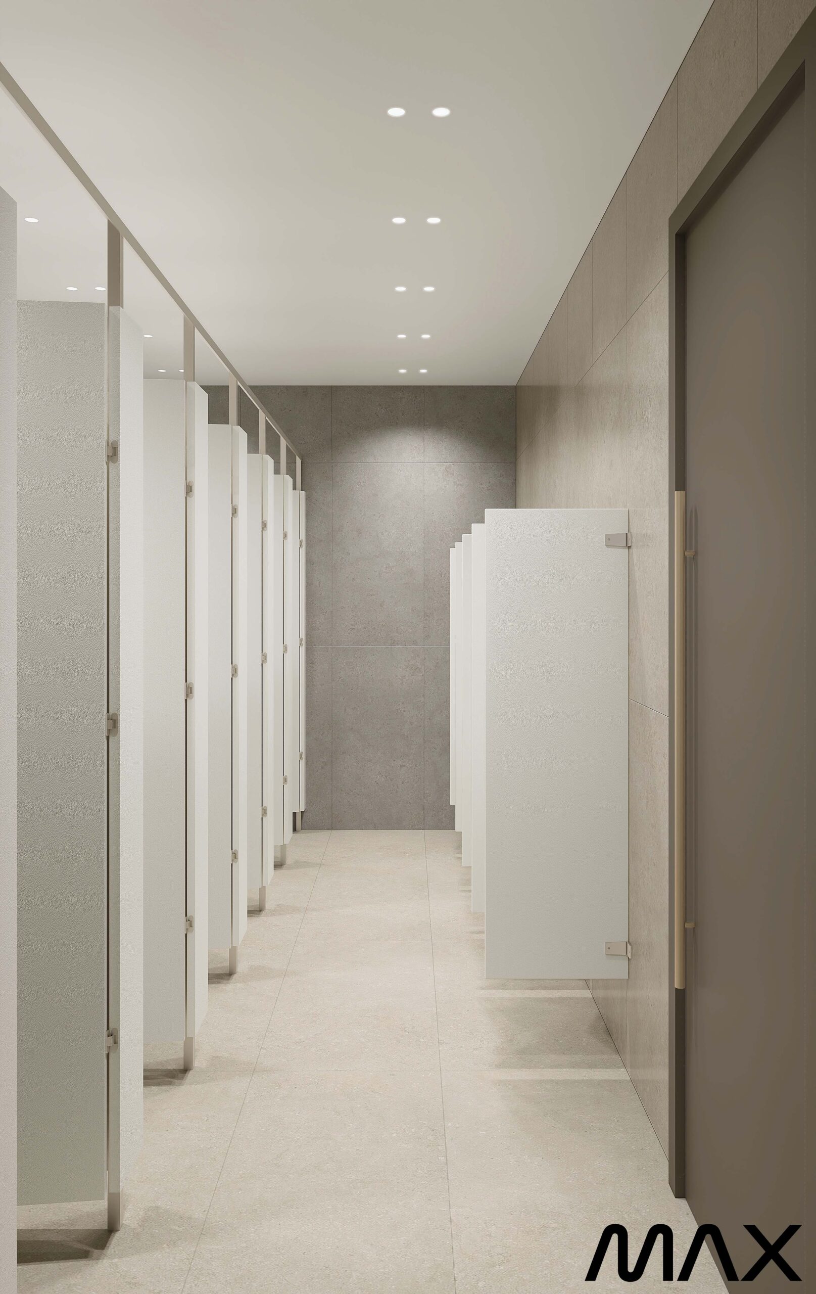 Modern public restroom with multiple stalls.