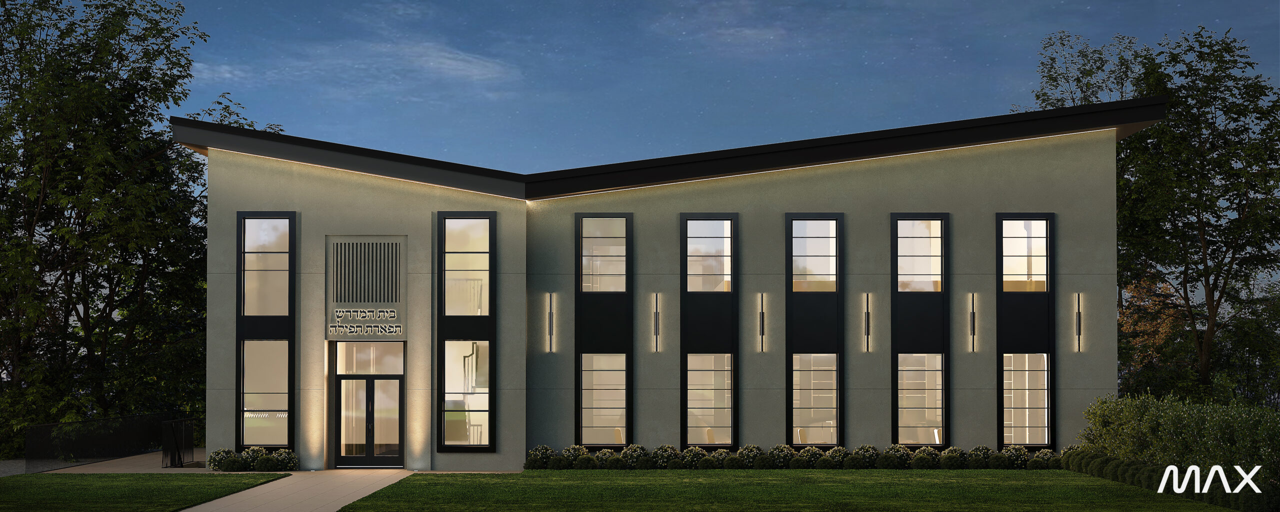 Modern building exterior with illuminated windows.