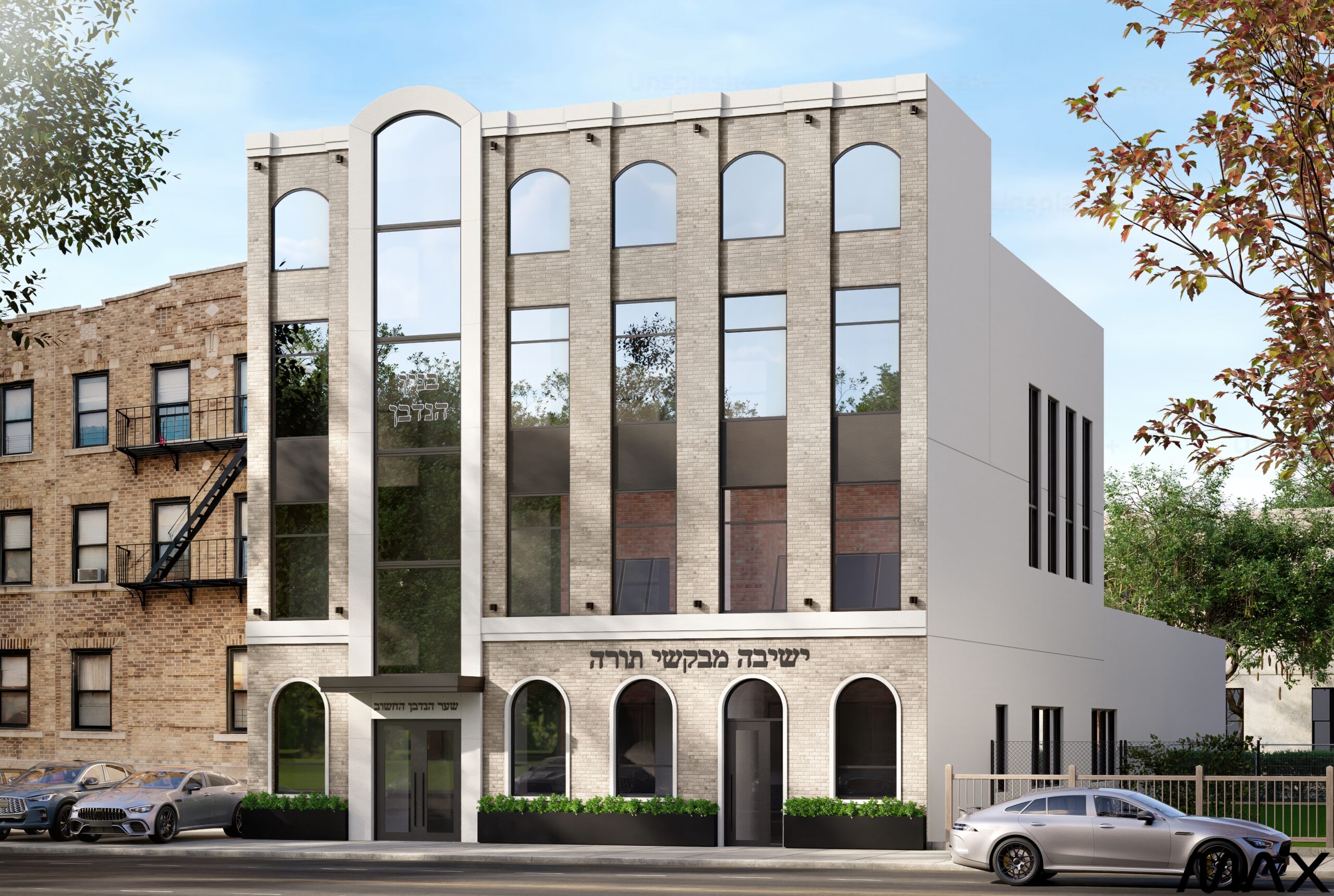 Modern three-story brick and glass building.