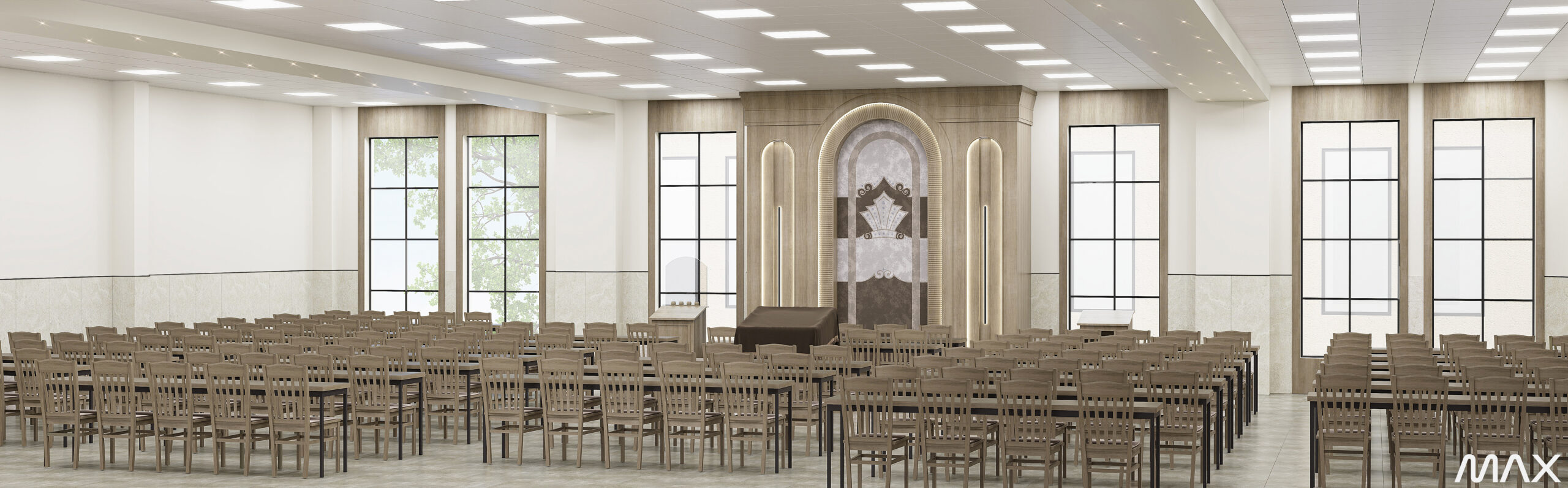 Spacious synagogue interior with numerous chairs.
